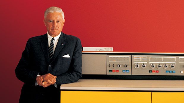 IBM System/360 promotional photograph, with Tom Watson Jr. and IBM representatives demonstrating the new system